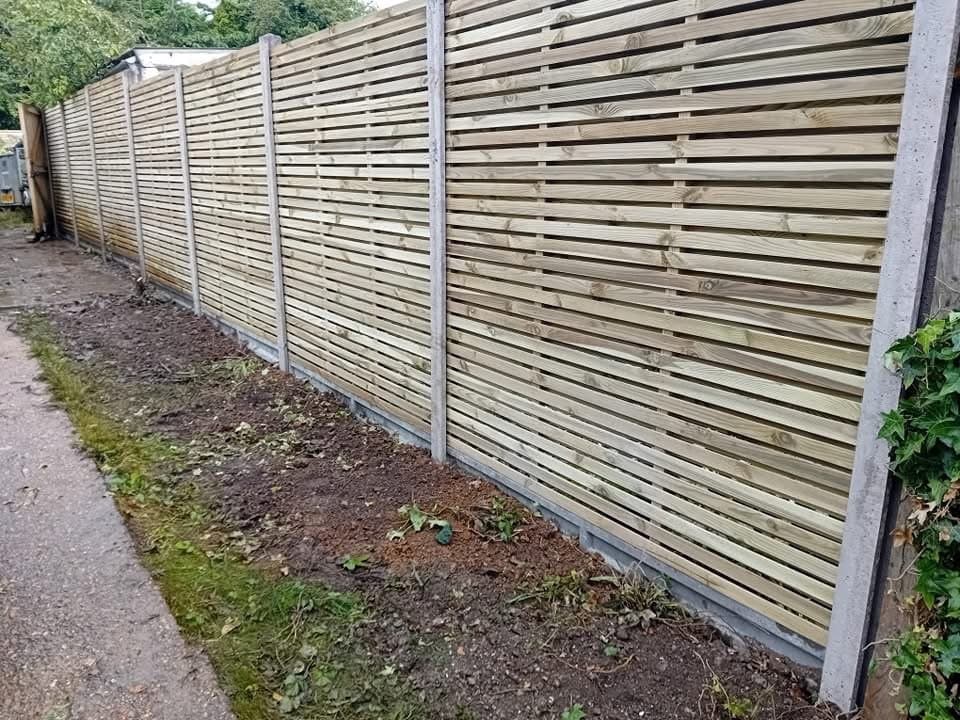 Full landscaping job including turfing, fencing and patio installation