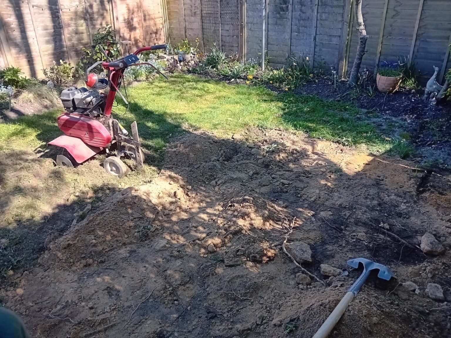 Before – patchy, uneven lawn in Steyning before returfing