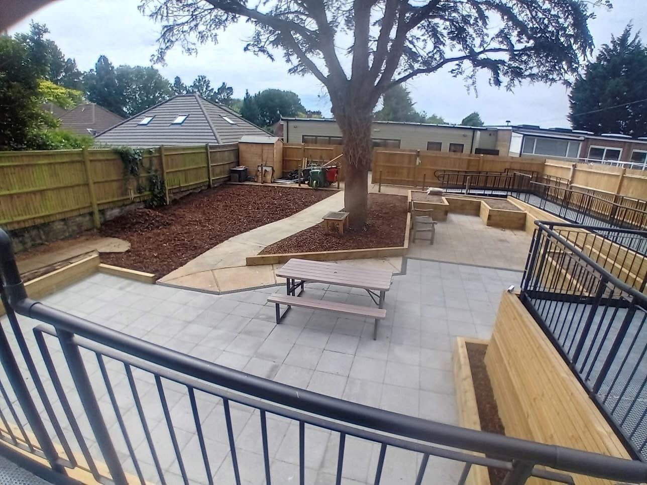 Full landscaping job including turfing, fencing and patio installation